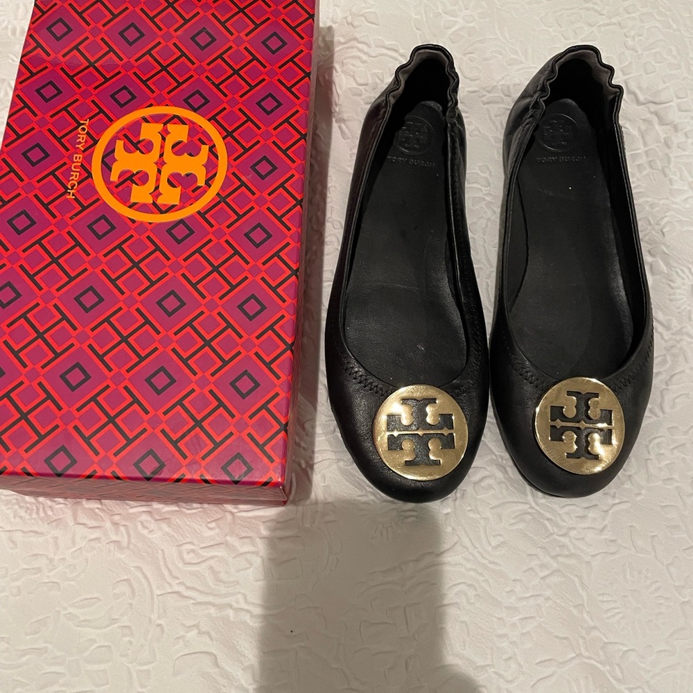 Tory Burch Black and Gold Flats with Signature Medallion